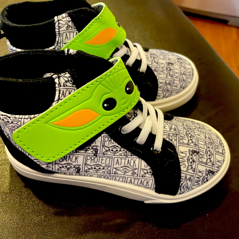 Never worn mandalorian baby yoda shoes size 10.